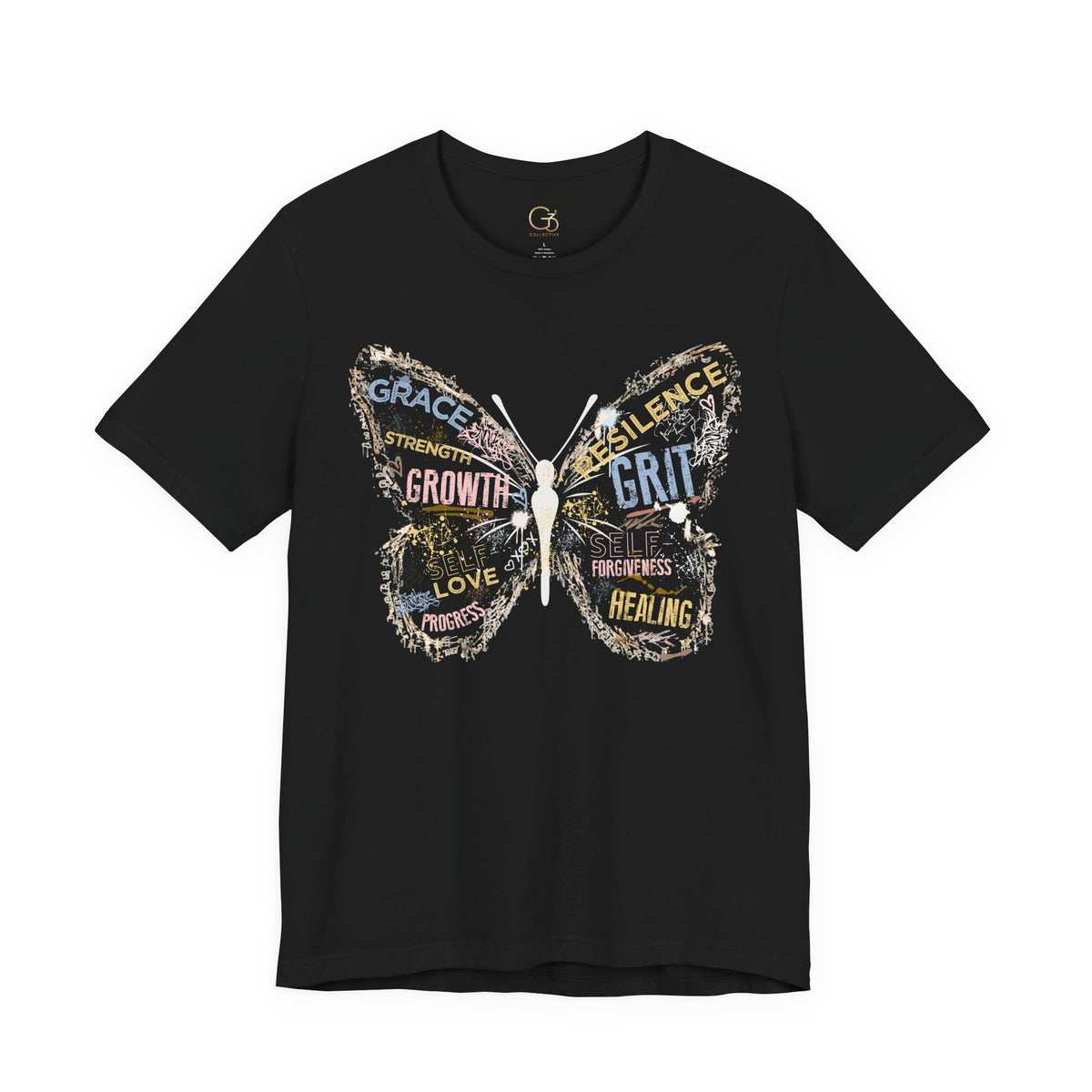 A black short-sleeve crewneck t-shirt featuring a large butterfly graphic on the front. The butterfly is composed of distressed text and words like 'GRACE', 'STRENGTH', 'GROWTH', 'RESILIENCE', 'BRIT', 'LOVE', and 'HEALING' in muted yellow, blue, and gray tones.